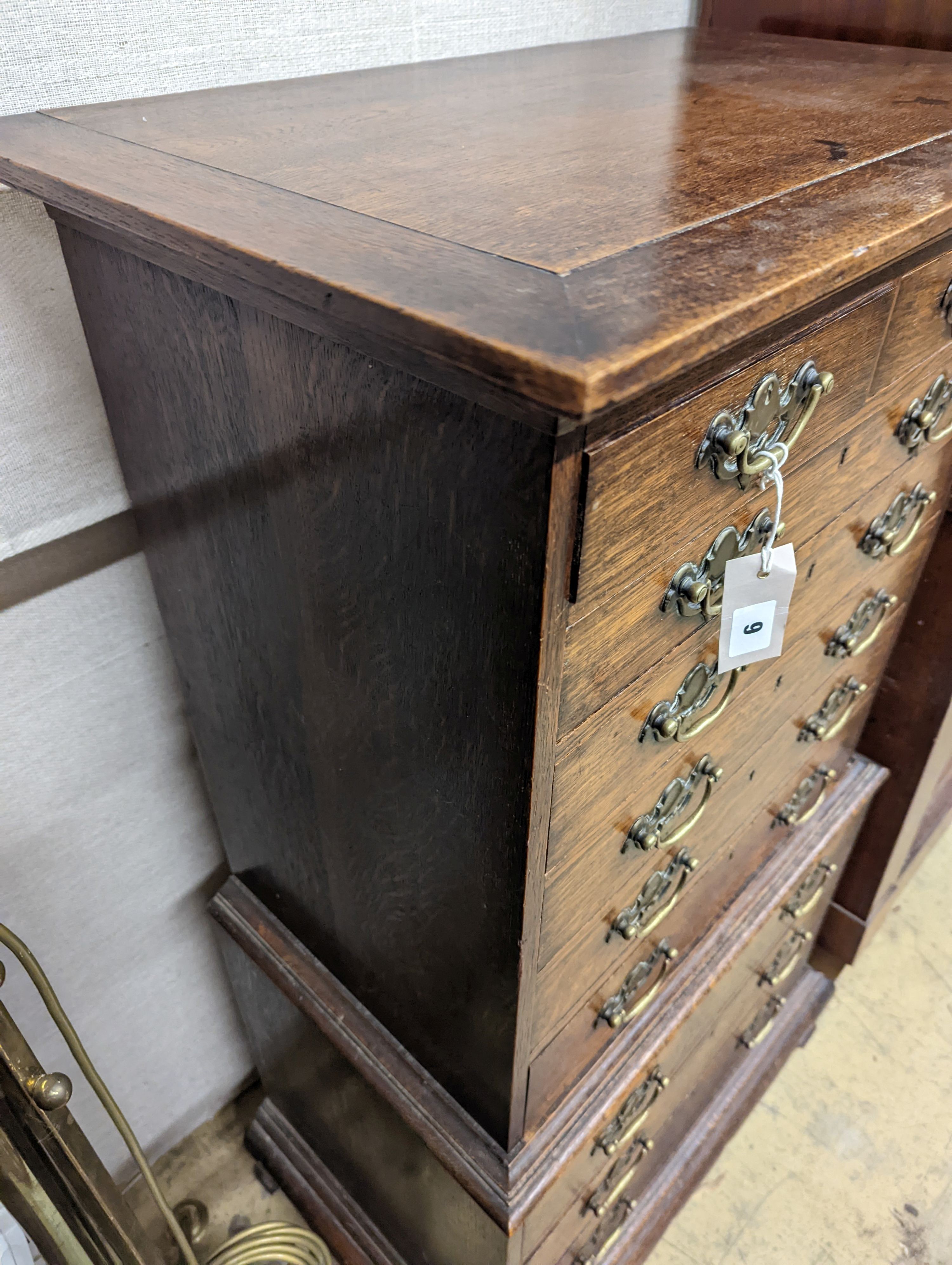 A small early 20th century oak tall chest, fitted ten drawers, width 60cm, depth 37cm, height 111cm